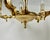 Exquisite pair of vintage chandeliers from Saeval, a renowned Spanish lighting manufacturer. Crafted from rich, golden...