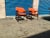 Danish Modern Ingmar style lounges. Chairs are done in an orange chenille. The frames are made of teak. The chairs are...