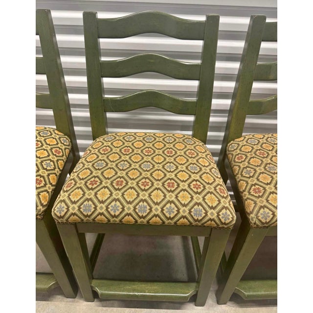 Set of 4 extremely solid Counter Stools that were bench made by Bausman & Company from Ontario, California. The finish is...