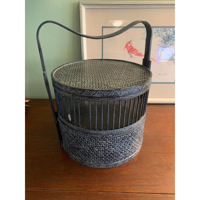A wonderfully sculptural antique Chinese wedding/betrothal basket — hand-woven bamboo finished in washed black lacquer...