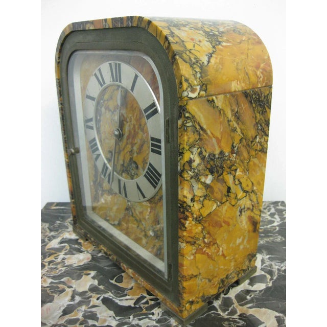 Tiffany & Co. Made in French marble clock with a Roman numeral dial. Complimentary delivery to New York City. We are the...