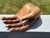 An Open Hand Beautifully executed artisan wood carving of an open human hand and wrist. Incredible detailing - note the...