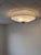 An elegant 1950s Finnish flush mount, manufactured by ARIS Oy. This authentic mid-century piece represents timeless...