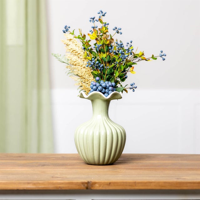 Freshen up your décor with the soft elegance of this Scalloped Ribbed Dolomite Vase. Featuring a gracefully flared, wavy...