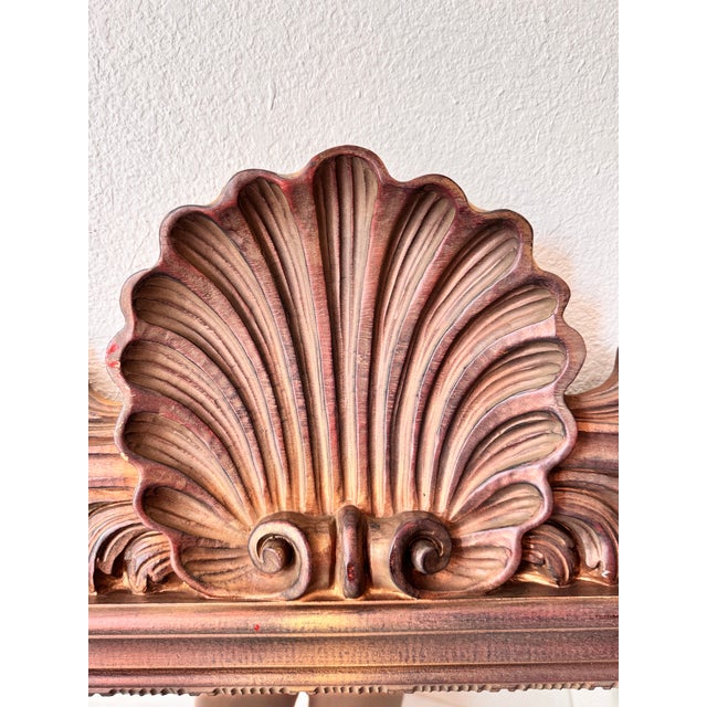 Elevate your space with this stunning Hollywood Regency wall mirror, featuring an exquisitely carved, oversized scalloped...