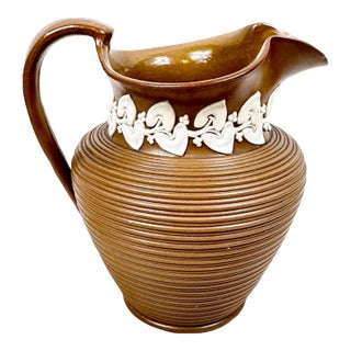 Late 19th Century French Brown Stoneware Bistro Pitcher With Relief Label For Sale