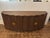 Stylish Revelation Grand Flute 4 Door Cabinet. Brown wood, gold hardware, fluted front. Original Retail $7275. Showroom...