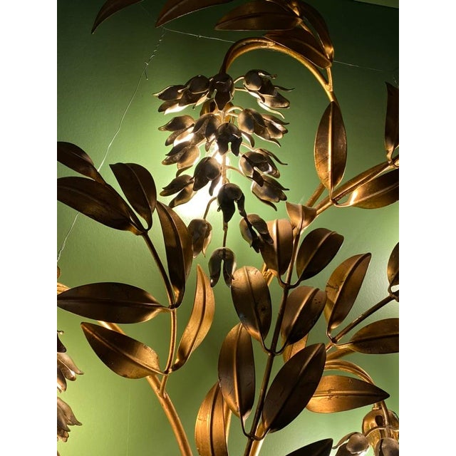 Gold leaf metal. Hans Kögl is a German designer. The luminaire has 4 E14 sockets. Functional electricity. This piece is...