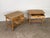 A handsome pair of Scandinavian mid-century oak nightstands or side tables designed by Henning Kjærnulf, dating from the...