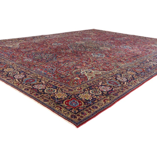 79003 Antique Persian Tabriz Rug, 10'08 x 13'10. This hand knotted wool antique Persian Tabriz rug stands as a monumental...