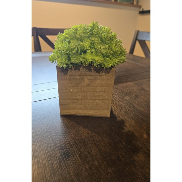 LOVE artificial flowers and wooden box. Good condition. Box shape 4x4 and 7 inches tall.