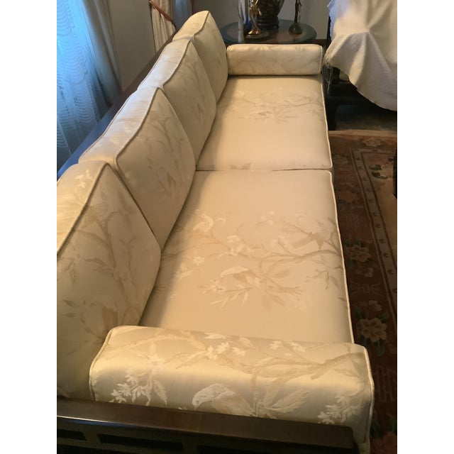 Century Furniture’s designer Raymond Sobota’s signature Chin Hua sofa design. The furniture is made of solid maple wood...
