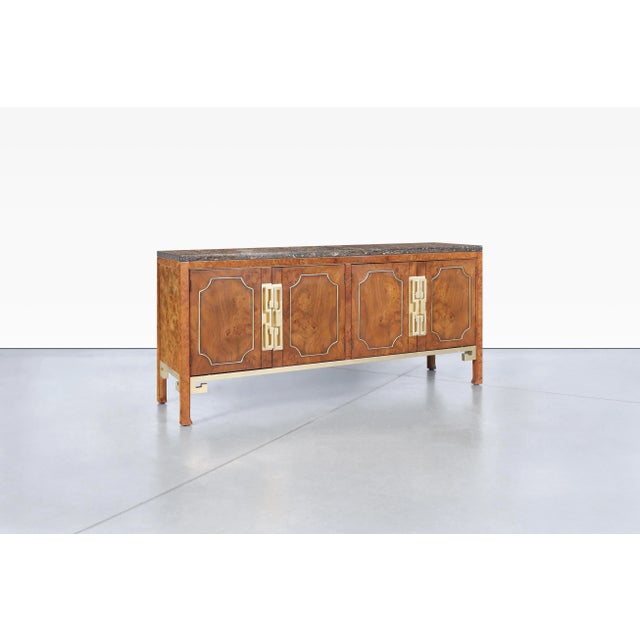 A striking example of 1970s American luxury, this exceptional credenza was designed by William Doezema and masterfully...