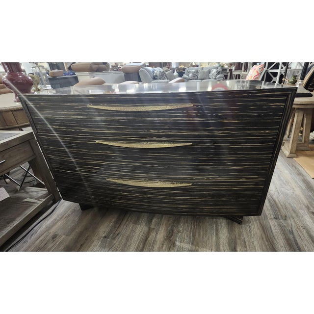 An understated beauty, this exquisite dresser conveys luxury from every perspective. Its softly bowed silhouette is...