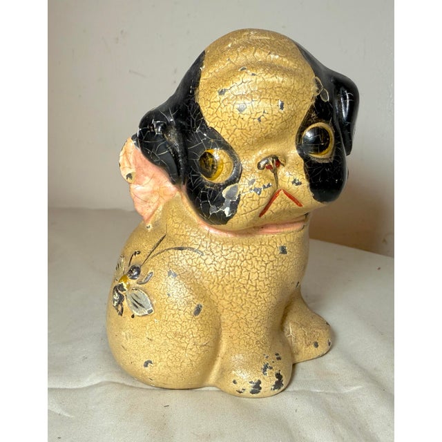 This Antique Grace Drayton for Hubley Cast Iron Dog with Bee Still Bank is a unique and collectible piece made during the...