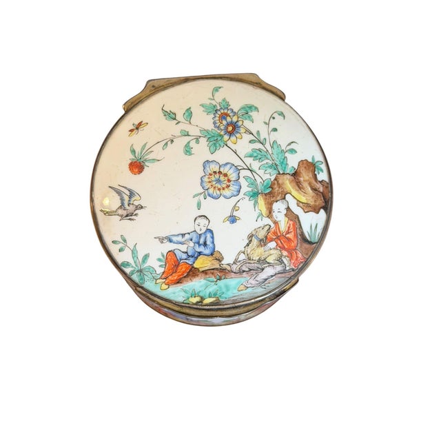 The Chinoiserie themed snuffbox with figures on lid as well as interior lid, sides and underside. Comparable example in...