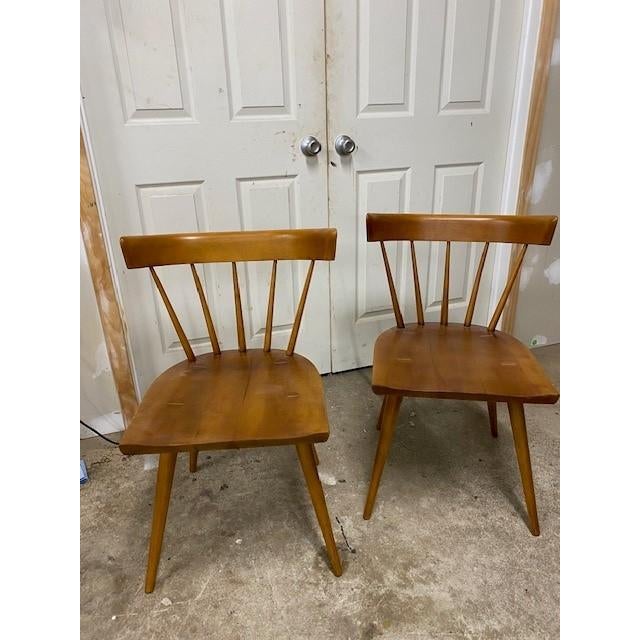 in the style of the iconic Planner Group by Paul McCobb. Made of solid maple . this pair of side chairs are very well...