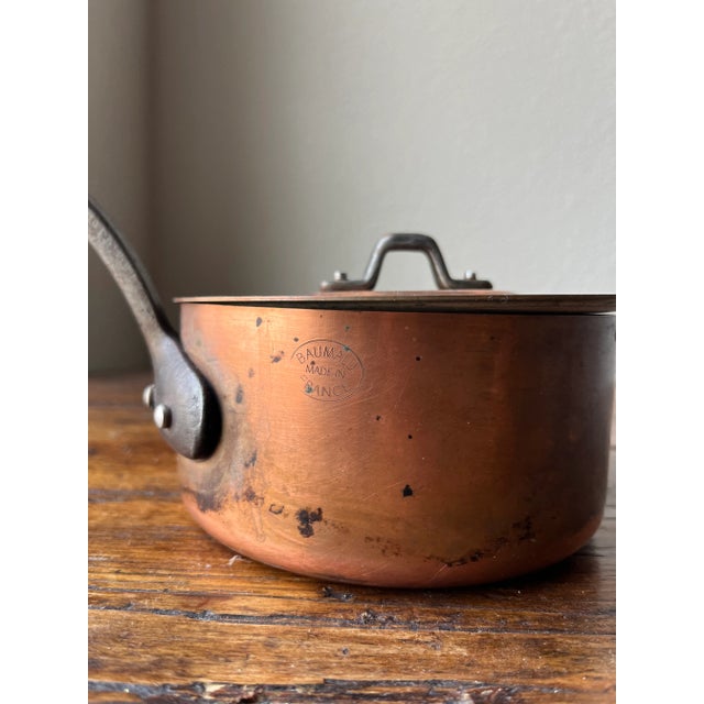 Baumalu Made in France Saucepan with lid. Made of Copper and cast iron. 5.6” diameter, 10.5” length (pot to top of the...