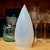 This antique hand-blown pendant light shade dates to the early twentieth century and is executed in opalescent uranium-...