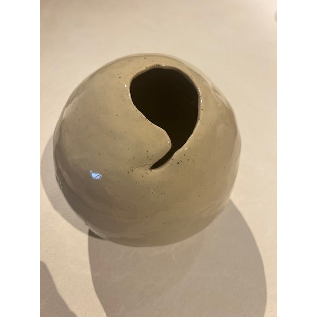 Dimensions: 7” w x 7.5” h Material: stoneware Finishing: glazed Color: beige Edition: one-of-a-kind