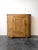 This rare 19th century English pine “huffer” cabinet features a distinctive curved silhouette and a warm patina....
