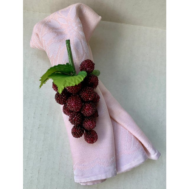 Fun set of napkin rings that have crystal beaded grapes in clusters in two shades of purple and burgundy. Total of 10...