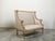 French 19th Century Louis XVI Style Giltwood Wingback Settee with Carved Motifs For Sale - Image 4 of 10