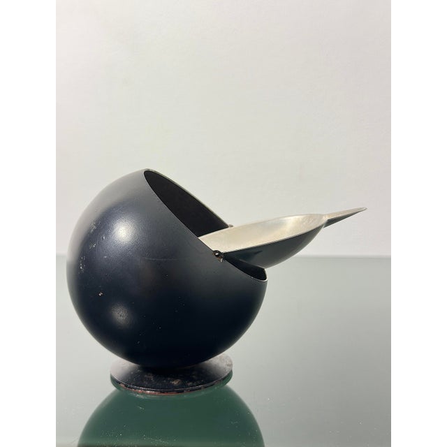 An icon of 20th-century design, the "Smokny" spherical ashtray, produced in the 1970s by the prestigious German...