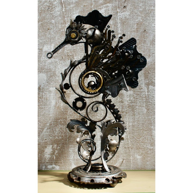 A fantastic custom steampunk sculpture. This sculpture is in the form of a stunning seahorse, completely made from...