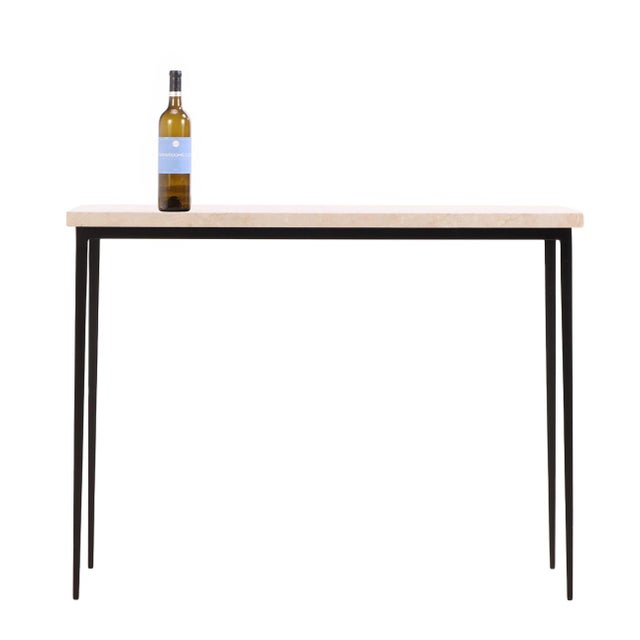 A refined pair of console tables inspired by the understated elegance and disciplined minimalism of Jean-Michel Frank....