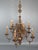 The 19th century dutch ten-arm chandelier is a beautiful example of historical craftsmanship and design. It originally...