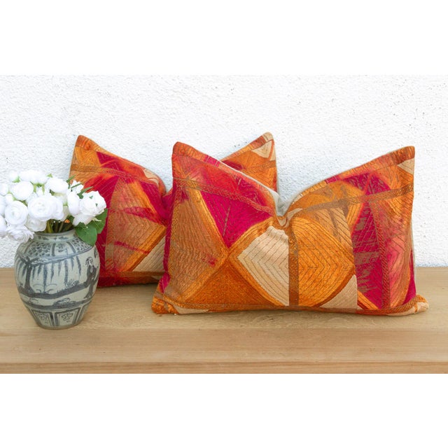 This curated set of two 12x20 inch lumbar pillows is a vibrant masterpiece from the Heirloom Bagh Collection. Repurposed...