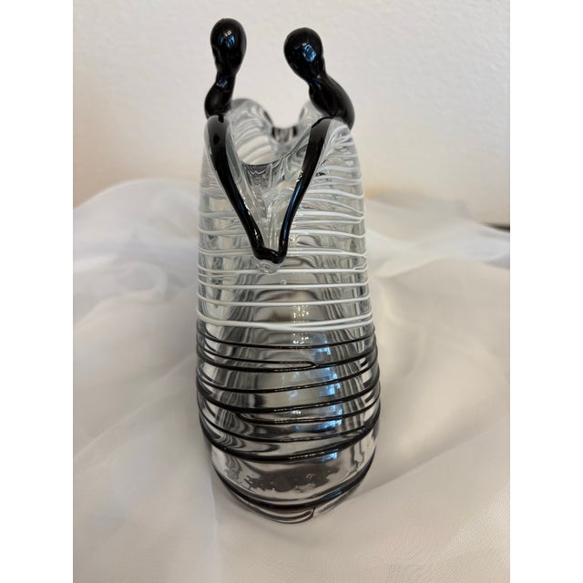 This Murano style black and white striped clutch is the epitome of style for your dressing room. Being 7" high, 8.5" wide...