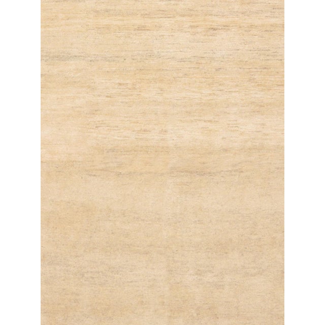 Gabbeh Hand-Knotted Area Rug is handmade with extra high pile and very simple, stylized designs. They are constructed from...