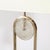 This striking mid-century modernist arch form floor lamp, crafted in the United States during the 20th Century, is a...