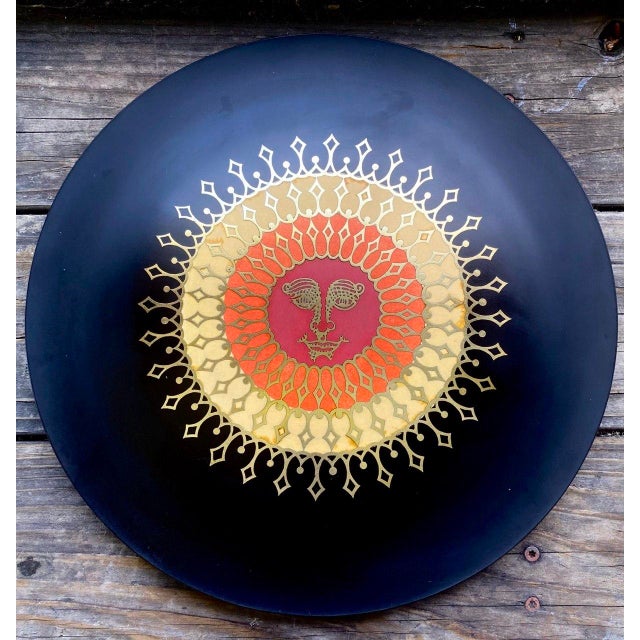 Vintage Couroc of Monterey round serving charger or decorative wall plaque featuring an extraordinary stylized sunburst...