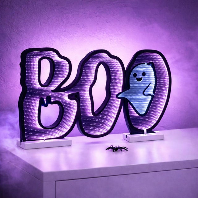 Create a spooky yet fun atmosphere this Halloween with the BOO/Ghost Ekkolight! Featuring the playful word "BOO"...