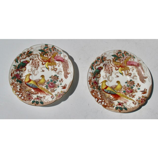 Two saucers for footed cups, measurements are 5.75" in diameter. Hallmarked to the backs with Mid-century red stamp....