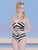 The painting features a poised figure in a black and white striped swimsuit, holding a firearm, set against a serene...