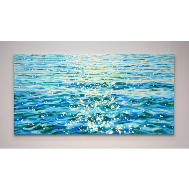 In this painting, I sought to capture the vibrant dance of sunlight on the ocean's surface, blending realism with touches...