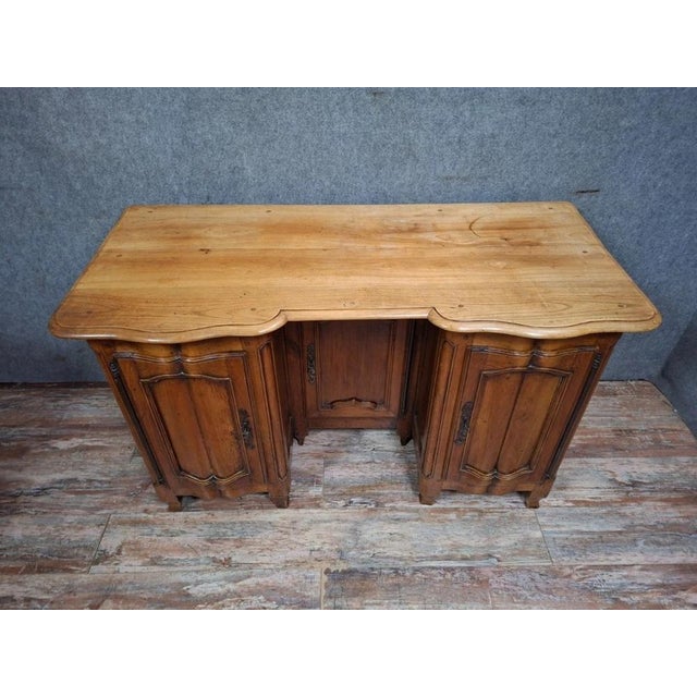 Double-sided curved walnut desk – regional work from the louis xv period – 18th century – later additions charming solid...