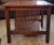 Stickley Mission Collection Oak Spindle Side Table, model 89-746, made in 2016. Dimensions: 22 in wide x 26 in deep x 23...