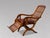 Stunning Pair of 19th-Century Victorian Walnut Colonial Reclining Armchairs, circa 1860 This rare and exceptional pair of...