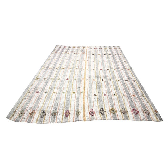 Vintage hand woven embroidered cotton Kilim rug from Adana region of Turkey. Approximately 50-60 years old. In very good...