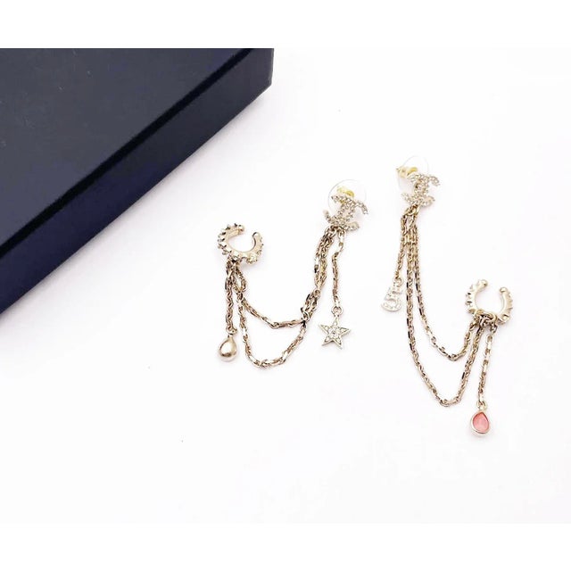 Chanel Gold CC Crystal Chain Star 5 Cuff Piercing Earrings *Marked 22 *Made in France *Comes with the original box and...