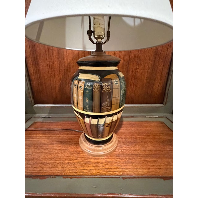 This vintage 1970s Library Book Table Lamp by Reliable Lamp & Shade Company features a unique design with a multicolor...