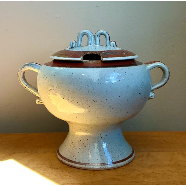 This vintage speckled ceramic footed tureen captures the understated elegance of Mid-Century Modern pottery design, its...