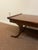 This is a beautiful inlaid top mahogany French Regency coffee table with lots of elegant flair and in good condition.