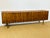 Stunning sideboard, a modernist design typical of 1960s Scandinavian furniture. The clean lines of the front feature four...
