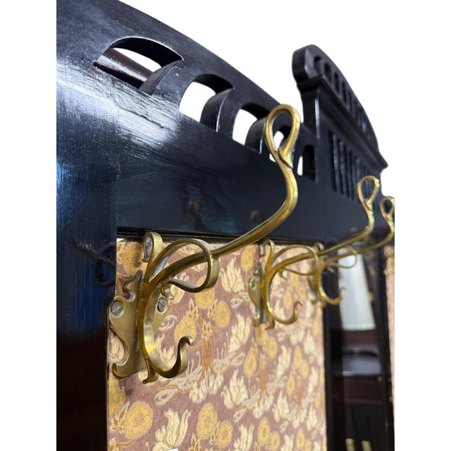 Original Art Nouveau wardrobe (No.2169) Original black Art Nouveau coat rack, made around 1910. Six coat hooks, a small...